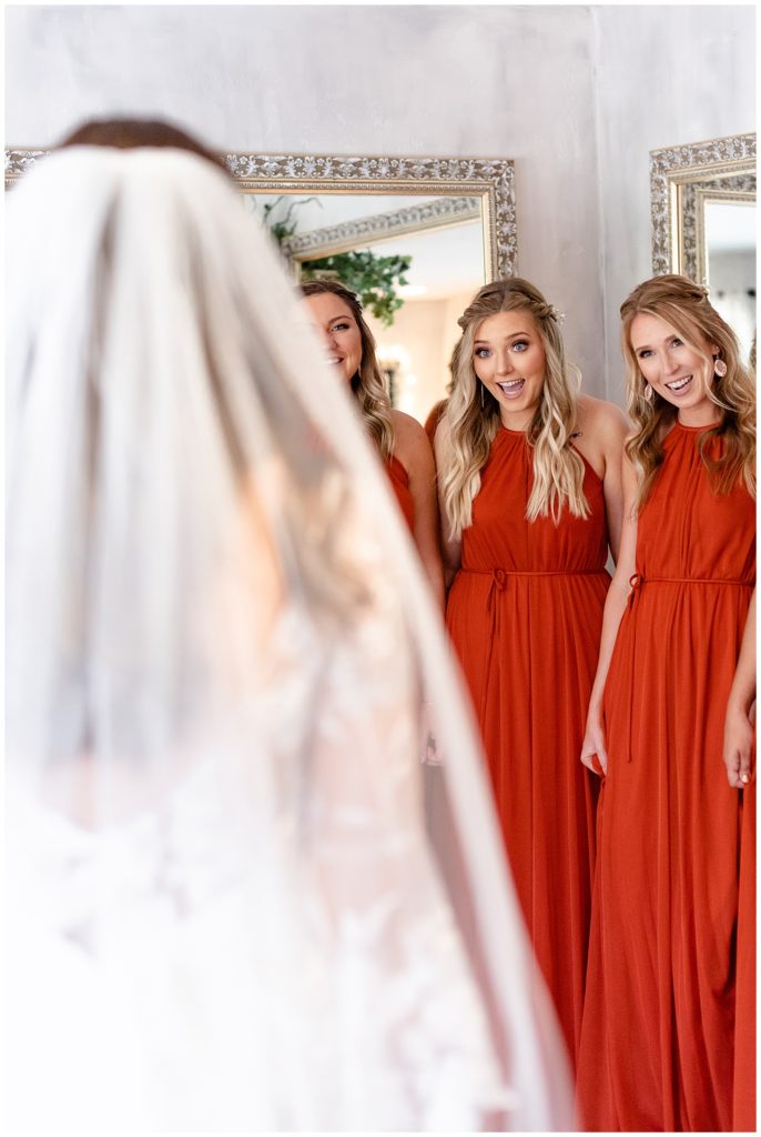 The Best Boise Wedding Photographers, Denise and Bryan Photography. Bridesmaids reveal. Burnt orange wedding colors