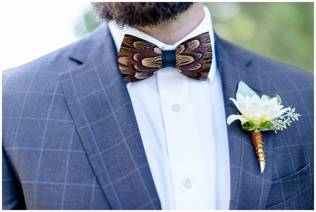 The Best Boise Wedding Photographers, Denise and Bryan Photography. Duck feather bow tie for groom