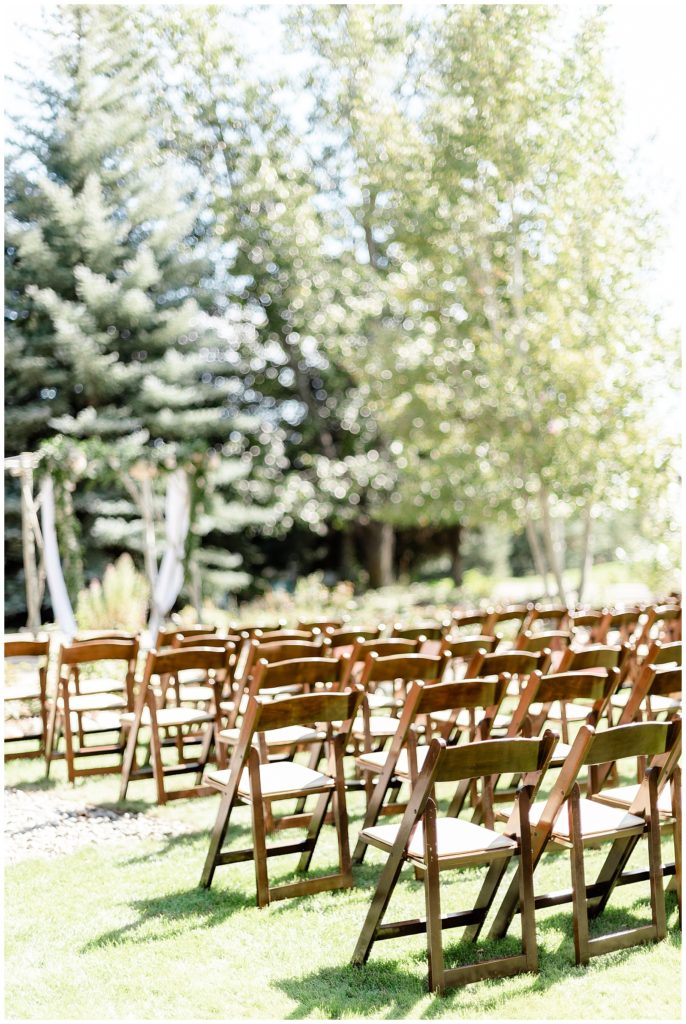 Sun Valley Wedding Photographer Denise and Bryan Photography. Ceremony chairs, dark wood
